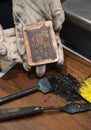 The ancient technique of etching. Engraving of the plate. Royalty Free Stock Photo