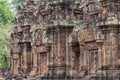 Ancient temple Banteay Srei bas-relief, Angkor Wat, Cambodia. Stone carved decor on hindu temple Royalty Free Stock Photo