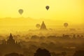Ancient temple and hot air balloon fly over sky in Bagan after sunrise Royalty Free Stock Photo