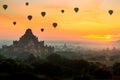 Ancient temple and hot air balloon fly over sky in Bagan after sunrise Royalty Free Stock Photo