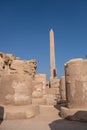 Ancient Temple of Karnak in Luxor - Ruined Thebes Egypt. Obelisk and ruined columns  at Karnak Temple. Temple of Amon-Ra Royalty Free Stock Photo