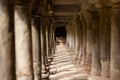 Ancient Temple Pillars Under a Walkway in Angkor Thom, Cambodia Royalty Free Stock Photo