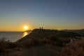 The ancient Temple of Poseidon during sunset at Sounio, Attica, Greece