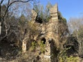 The ancient temple ruins in the mountains are steeped in history, weathered by time and the elements