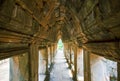 Ancient temple ruins near Angkor Wat, Siem Reap, Cambodia. Ancient buddhist temple corridor view.