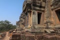 Temple ruins with pillars, reconstruced, saftey, construction in angkor wat, cambodia, forest in the background