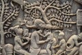Ancient temple stone carved bas-relief in Angkor Wat. Mother and child bas-relief closeup. Angkor Wat Bayon temple Royalty Free Stock Photo