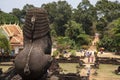 Ancient temple stone monument of Roluos temples, Cambodia. Barong lion statue on top of Bacong temple.