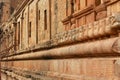 Dravidian styled stone wall designs in the ancient Brihadisvara Temple in Thanjavur, india. Royalty Free Stock Photo