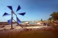 Ancient Thai traditional water wheel pump and wind mill. Royalty Free Stock Photo