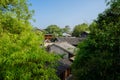 Ancient tile-roofed houses in sunny spring morning at Qingyan to