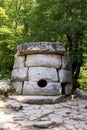 Ancient tiled dolmen in the valley of the river Jean near Black Sea, Russia, southeast of Gelendzhik Royalty Free Stock Photo