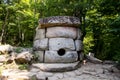 Ancient tiled dolmen in the valley of the river Jean near Black Sea, Russia, southeast of Gelendzhik Royalty Free Stock Photo