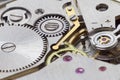 Ancient tiny metal clockwork close up Royalty Free Stock Photo