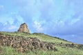 Ancient tomb against an early morning blue sky