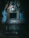 Old crypt with death signs. Halloween, gothic tombstone. Royalty Free Stock Photo