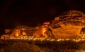 Ancient tombs of Hegra city illuminated during the night panorama, Al Ula Royalty Free Stock Photo
