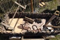 ancient tools and iron products lie in a large wicker box