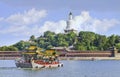 Ancient tour boat with white stupa, Beihai Lake, Beijing, China