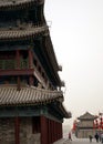 Ancient tower in a fog day in xian city wall with pagodas Royalty Free Stock Photo