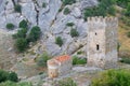 Ancient Genoese fortress tower and temple Royalty Free Stock Photo