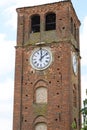 Ancient tower with iron mechanical clock Royalty Free Stock Photo