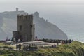 Ancient tower over Cliffs of Moher