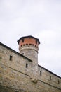 Ancient tower and wall exterior of old Kamianets-Podilskyi castle, Ukraine. Stone walls of medieval castle near canyon, historical Royalty Free Stock Photo