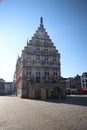 Ancient town hall building of the city Gouda in the Netherlands on the market square with blue sky Royalty Free Stock Photo