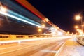 Ancient town of Nesebar UNESCO - protected. Road, night lights, windmill. Car light trails. Long exposure photo