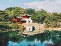 A Chinese ancient pavilion by the lake gardens at Montreal Botanical Garden Royalty Free Stock Photo