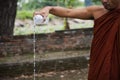 Ancient traditional thai rite ritual with thai monks making pouring water of dedication transference of merits to departed Royalty Free Stock Photo