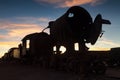 Ancient train cemetery at sunset Royalty Free Stock Photo