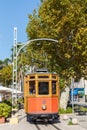 Ancient tram Tranvia de Soller public transport transit transportation traffic portrait format on Mallorca in Port de Soller,