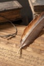 Ancient Treatise with bird feather Royalty Free Stock Photo