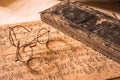 Ancient Treatise with very old glasses Royalty Free Stock Photo