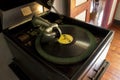 Old turntable On the wooden table