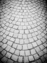 Ancient type of road paving, made of lava stone squares, with a harmoniously semi-circular structure Royalty Free Stock Photo