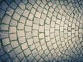 Ancient type of road paving, made of lava stone squares, with a harmoniously semi-circular structure Royalty Free Stock Photo