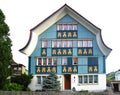 Ancient unique colourful house in historic medieval old town. Appenzell is well-known for its colourful houses with painted facade