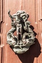 Ancient Venetian door with old door knob close-up Royalty Free Stock Photo