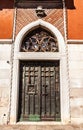 Ancient Venetian metal door. Royalty Free Stock Photo