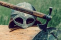 Ancient Viking armor. Helmet and ax. Close-up. Historical photo concept