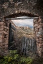 Village of Montemaggiore in Corsica through gate Royalty Free Stock Photo