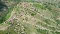 Ancient village on top of mountain. Action. Top view of mystical abandoned settlement on top of mountain. Abandoned