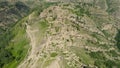 Ancient village on top of mountain. Action. Top view of mystical abandoned settlement on top of mountain. Abandoned