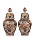 Ancient vintage imari ceramic ginger jars isolated on white