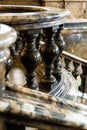 Ancient vintage marmoreal marble stairs with balusters in daylight