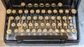 Ancient vintage portable typewriter with qwerty keyboard