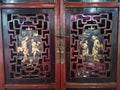 Ancient vintage wooden art carving door of antique retro wood cabinet in Baan Thein Suek Museum for thai people traveler travel